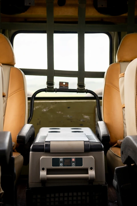 Onboard cooler between the passenger seats